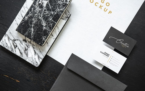 Modern black and white business card design.