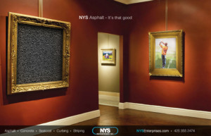 Concrete asphalt surface framed in a museum with other art. advertisement for NYS Asphalt.